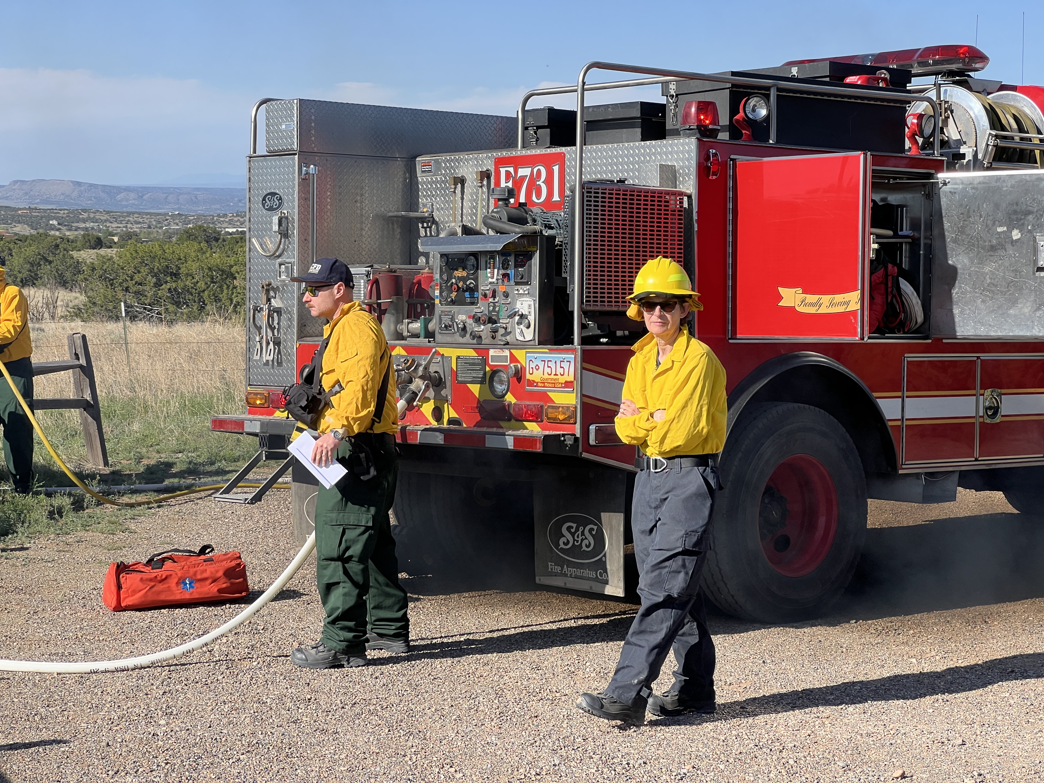 Members alongside Engine 731 during training